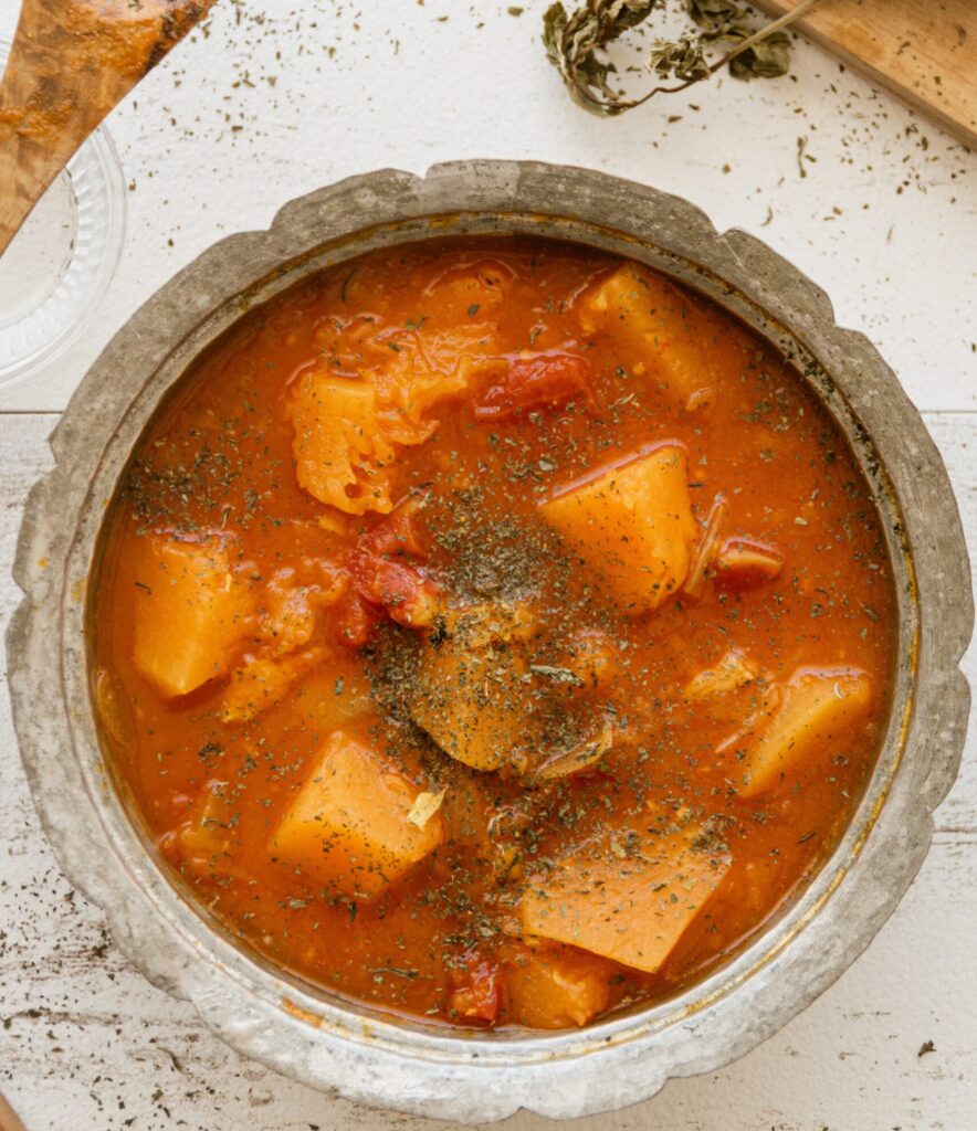 Peanut stew in a wooden bowl